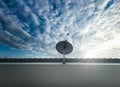Lookup high angle at satellite dish on cloudy sky background Royalty Free Stock Photo