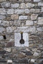 Loophole of a medieval castle Royalty Free Stock Photo