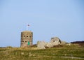 Loophole towers in Guernsey that guard the coastline.