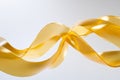 looping liquid ribbon in gold, gently flowing and intertwining, creating an elegant and soothing