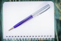 Loose-leaf notebook with a pen on the table Royalty Free Stock Photo