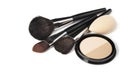 Loose powder, various makeup brushes. Royalty Free Stock Photo