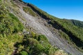 The loose rock face and landslide area of Boomerang Slip track in Egmont national park, New Zealand. Royalty Free Stock Photo