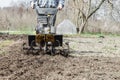 Loosens the soil cultivator close-up Royalty Free Stock Photo