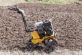 Loosens the soil cultivator side view Royalty Free Stock Photo