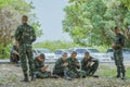 LOPBURI THAILAND, MARCH 24, 2019 : Thai cadets relax after completing the parachute training at Ban Tha Duea Drop Zone on March 24