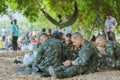 LOPBURI THAILAND, MARCH 23, 2019 : Thai cadets relax after completing the parachute training at Ban Tha Duea Drop Zone on March 23