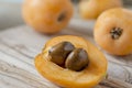 Loquat fruits on a wooden board Royalty Free Stock Photo