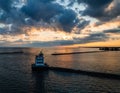 Lorain Lighthouse at Sunrise with orange and clouds