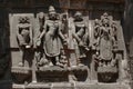 Lord Brahma, Vishnu and women servers stone sculpture on Shree Ganga Godavari temple, Nashik, Maharashtra