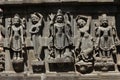 Lord Brahma, Vishnu and women servers stone sculpture on Shree Ganga Godavari temple, Nashik, Maharashtra