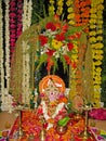 Lord Ganesh with utensils for worship