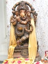 Lord Ganesha playing flute