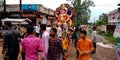 Lord Ganesha traditional immersion ceremony road show by Hindu religious people crowd