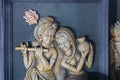 Lord Krishna playing flute and Radha smiling,Goddess Durga with Son Ganesh, decorative terracotta idols made in Krishnanagar,