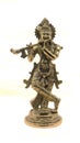 lord krishna playing flute shiny bronze statue Royalty Free Stock Photo