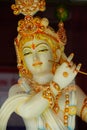 Lord Krishna statue close up image with holding a flute Royalty Free Stock Photo