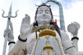 Lord Shiva Statue. Masterpiece Marble sculpture Meditating Shiva Statue. Large Majestic. Low angle view Royalty Free Stock Photo
