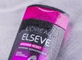 LOreal elseve shampoo isolated on gradient background. Royalty Free Stock Photo