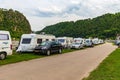 Loreley, Germany - May 24, 2019: Caravans and recreational vehicles camp on the banks of the Rhine River in the Rhine River Gorge Royalty Free Stock Photo