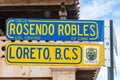 Street signs in the town of Loreto