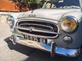 Loriol sur Drome, France - 17 September, 2022: Front Vintage of old car Peugeot 403 on the street.