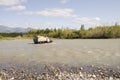 Lorry - a gasoline tanker crossing a river in a mountainous area in a remote region of Eastern Siberia.