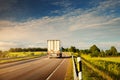 Lorry moving on sunny evening Royalty Free Stock Photo