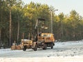 A lorry  with a trailer and a small crane Royalty Free Stock Photo