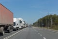 Lorry trucks row in traffic jam on highway Royalty Free Stock Photo