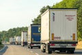 Lorry trucks and tank trucks moving on the highway, July 2021, Prague. Czech Republic