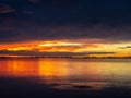 Los Alcazares, Region of Murcia, Spain. Amazing sunrise at seaside with sun reflection on water