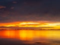 Los Alcazares, Region of Murcia, Spain. Amazing sunrise at seaside with sun reflection on water