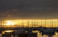 Los Alcazares, Spain. The seaport during an amazing sunrise with sun reflection on water Royalty Free Stock Photo