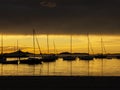 Los Alcazares, Spain. The seaport during an amazing sunrise with sun reflection on water Royalty Free Stock Photo