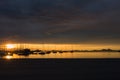 Los Alcazares, Spain. The seaport during an amazing sunrise with sun reflection on water