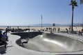 Los Angeles, CA - August 9 2021: Skate board park at Venice beach with young boy practicing outdoors Royalty Free Stock Photo