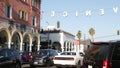 LOS ANGELES CA USA - 16 NOV 2019: California summertime Venice beach aesthetic. Iconic retro sign hanging on street. Famous symbol Royalty Free Stock Photo