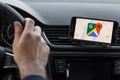 LOS ANGELES, CALIFORNIA - JUNE 6, 2019: Close up to male driving and using navigation appliction Google Maps. Get direction. An Royalty Free Stock Photo