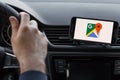 LOS ANGELES, CALIFORNIA - JUNE 6, 2019: Close up to male driving and using navigation appliction Google Maps. Get direction. An Royalty Free Stock Photo