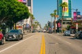 Sunset Boulevard in West Hollywood on a bright sunny day. Architecture, traffic, city life
