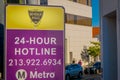 Los Angeles, California, USA, AUGUST, 20, 2018: Outdoor view of informative sign of Metro logo hotline, LA Metro is the
