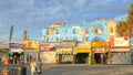 LOS ANGELES, CALIFORNIA, USA - AUGUST 25, 2015: wide shot of the vendors along the boardwalk at venice beach