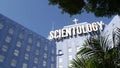 Church of Scientology exterior, facade of blue building, logo and cross. Los Angeles California USA