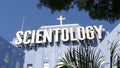 Church of Scientology exterior, facade of blue building, logo and cross. Los Angeles California USA