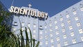 Church of Scientology exterior, facade of blue building, logo and cross. Los Angeles California USA