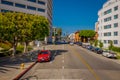 Los Angeles, California, USA, JUNE, 15, 2018: Outdoor view of caras parked at onde side of the streets of Beverly Hills Royalty Free Stock Photo