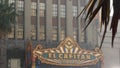 LOS ANGELES, CALIFORNIA, USA - 7 NOV 2019: El Capitan Theater shiny entrance sign. Retro signboard glowing on Walk of Fame,