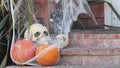 LOS ANGELES, CALIFORNIA, USA - 29 OCT 2019: Scary festival decorations of a house, Happy Halloween holiday. Doorway stairs with