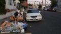 LOS ANGELES, CALIFORNIA, USA - 30 OCT 2019: Stack of waste on street roadside. Junk problem and recycling issues, pile of trash